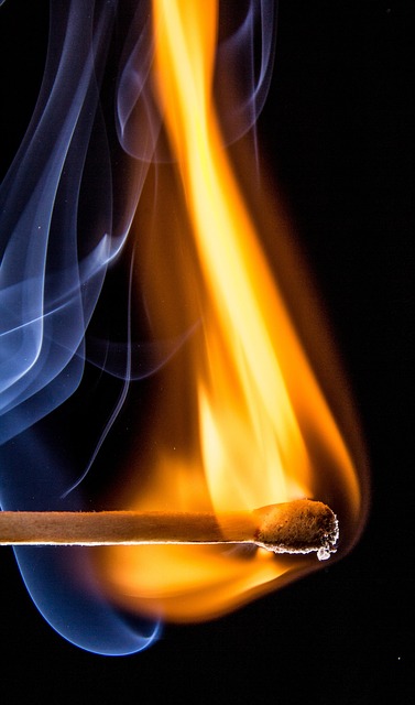 Close-up of burning match